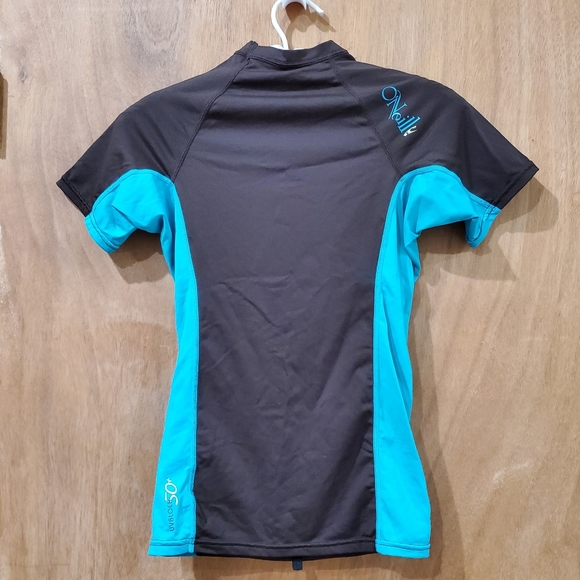 O'NEILL BROWN AND TEAL SHORT SLEEVE RASH GUARD SIZE SMALL - Picture 3 of 12
